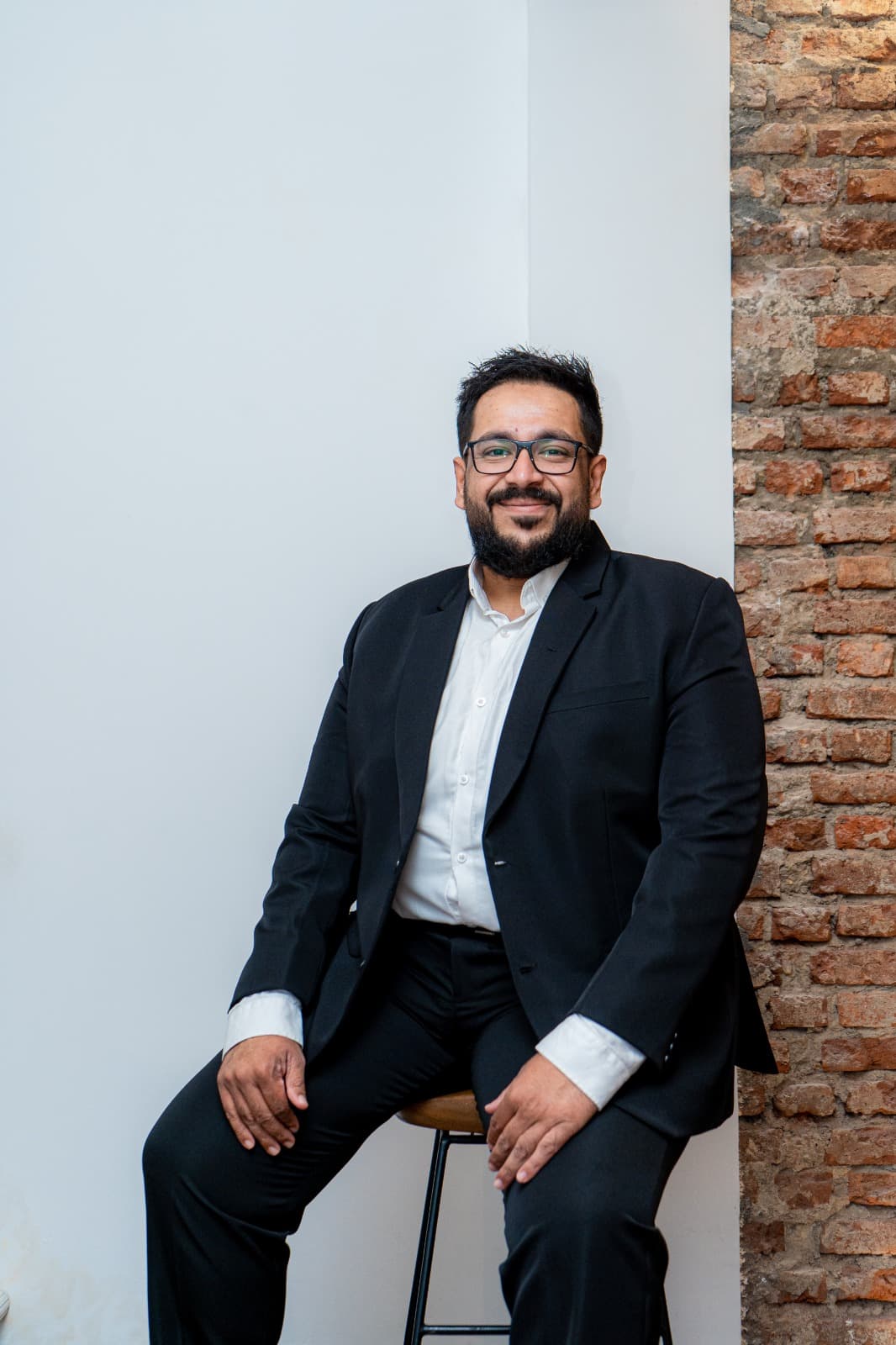 Hatim Malick - Founder & Director